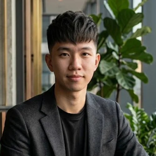 Man with a clean French crop fade haircut for straight hair, featuring a neatly textured top and sharp fade on the sides for a fresh, structured look.